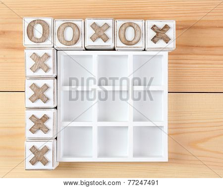 Game of Tic Tac Toe on wooden background