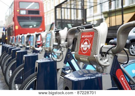 LONDON, UK - APRIL 02: Detail of Boris bikes in line. April 02, 2015 in London. On 27 February 2015. Mayor Boris Johnson secured Santander's sponsorship on the bike's scheme to replace Barclays bank.