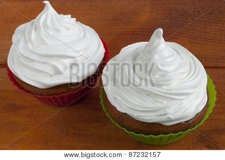 Sweet Couple Muffins Under A White Cream