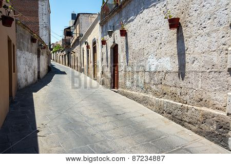 Narrow Alley And Stone Buildings