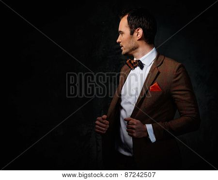 Sharp dressed fashionist wearing jacket and bow tie