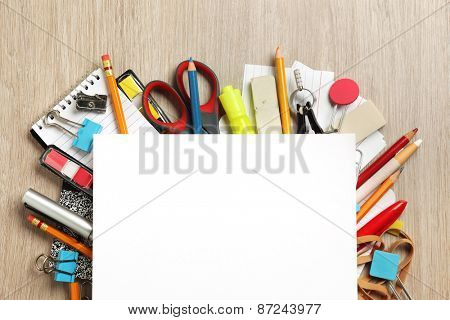 Blank paper on lots of office supplies