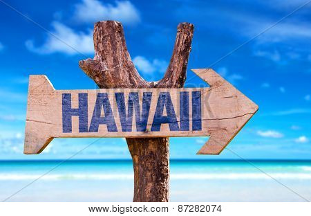 Hawaii sign with a beach background