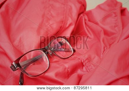 Black Glasses On A Background Of Red