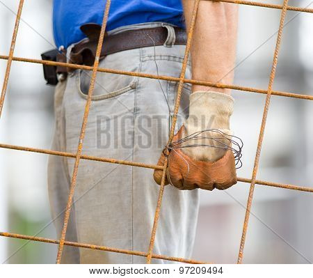 Worker Carrying Reinforcement Mesh