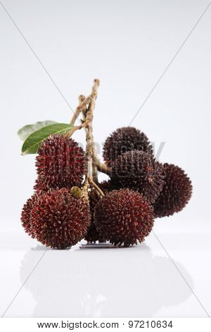 pulasan  thick skin or wild rambutan on the white background