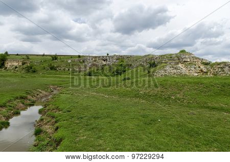 Background of sky, clouds, field  and river