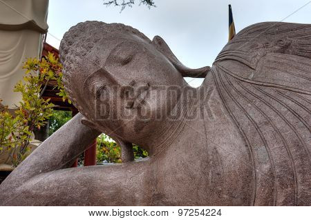 Buddhist statue head and shoulders