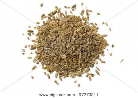 Heap of raw Freekeh on white background