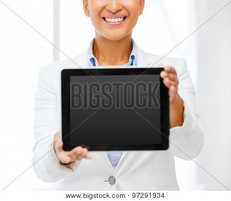 office, business, technology and internet concept - businesswoman with tablet pc in office