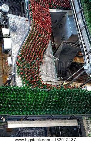 Ceske Budejovice, Czech Republic - June 30, 2016: Budvar Budweiser brewery. Bottle sorting washing and beer bottling workshop with assembly-lines.