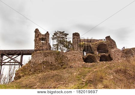 Zubstejn ruins of the castle built in the 13th century. It stands on a hill above the village Pivonice in Czech Republic. Overcast day