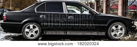 Kazakhstan, Ust-Kamenogorsk, march 29, 2017: Bmw E38 7-series, side view, abandoned car