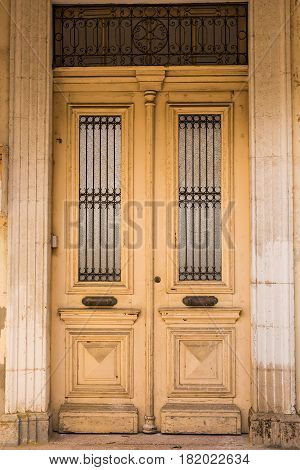 Wooden front door of a home. Front view of a wooden front door.