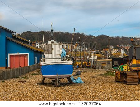 View Of The Seaside Town, Fishing Boats On The Shore, Stony Beach, Hill