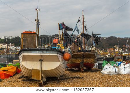 View Of The Seaside Town, Fishing Boats On The Shore, Stony Beach, Hill