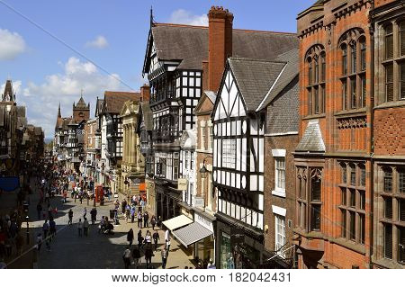 Chester England UK Europe - May 26 2014 : Tourists on Eastgate street in Chester City centre