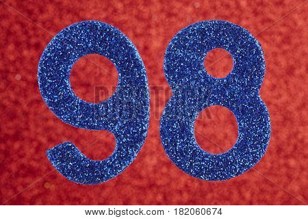 Number ninety-eight blue color over a red background. Anniversary. Horizontal