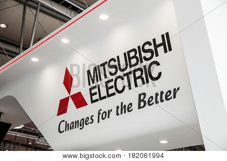 Hannover, Germany - March, 2017: Mitsubishi Electric logo sign on exhibition fair Cebit 2017 in Hannover Messe, Germany