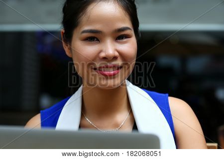 Beautiful Vietnam Smiling Female Student Using Notebook