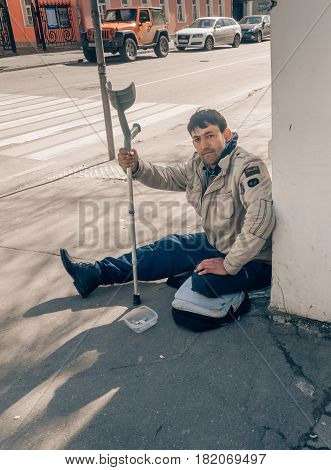 MOSCOW RUSSIAN FEDERATION - APRIL 22: Disabled begging in the city and asks for alms. April 22 2016 Novokuznetskaya street Moscow Russia