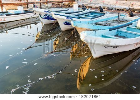 Boats Reflected In Rio Lagartos