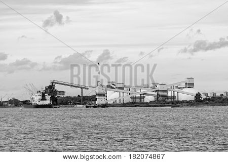 Maritime transportation industry. Container transshipment at port.