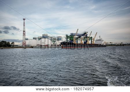 Maritime transportation industry. Mineral transshipment at port.