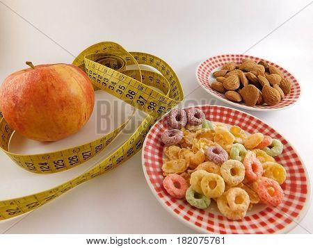 Healthy still life consisting of cereal and an apple. Concept of healthy life.