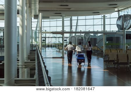 Madrid Spain: 24th July 2016: Airport staff is preparing for next fly. The Madrid-Barajas Airport is Spain's largest and busiest airport characterised by a floating roof propped by an internal coloured structure.
