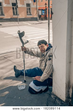 MOSCOW RUSSIAN FEDERATION - APRIL 22: Disabled begging in the city and asks for alms. April 22 2016 Novokuznetskaya street Moscow Russia