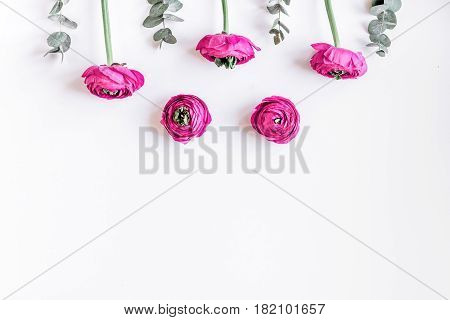 spring with bright flowers mock up on woman white desk background top view