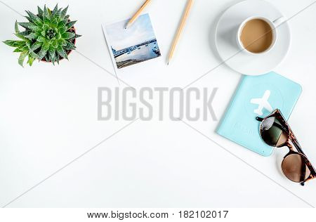 traveller set with cup of coffee and camera in vacation design on white table background top view mock up