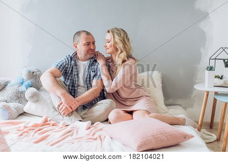 Happy father with his adult beautiful daughter