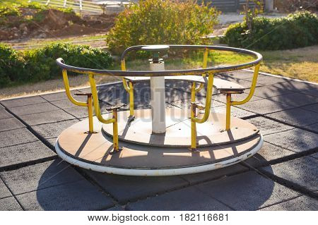 Children swing in the park at Playground. Children's playground outdoor