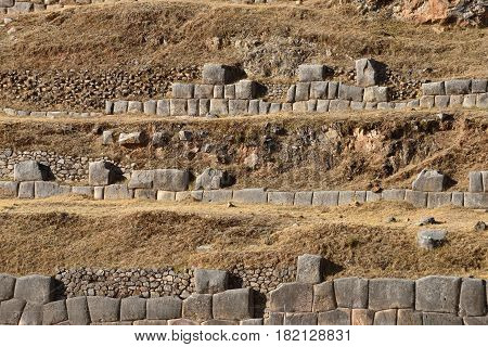 Inca wall in the village Saksaywaman Peru South America