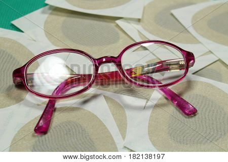 Orthoptic Eye Patch for occlusion therapy with child´s glasses/ These are eye patches for remedial strabismus.