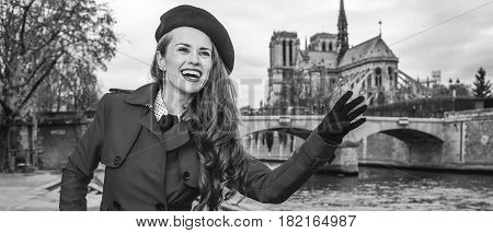 Traveller Woman On Embankment In Paris, France Handwaving