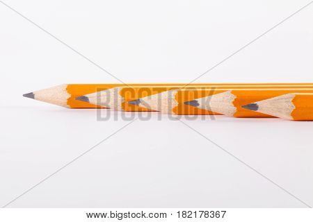 Five pencils isolated on pure white background