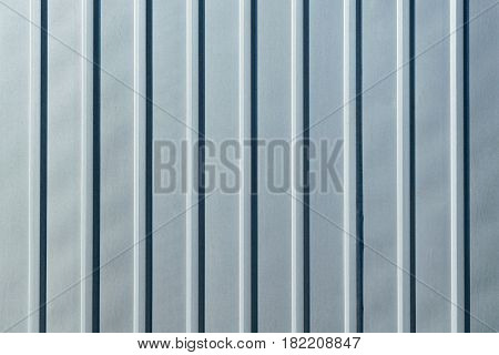 Galvanized sheet metal with longitudinal ribs. Sheet metal gray color.