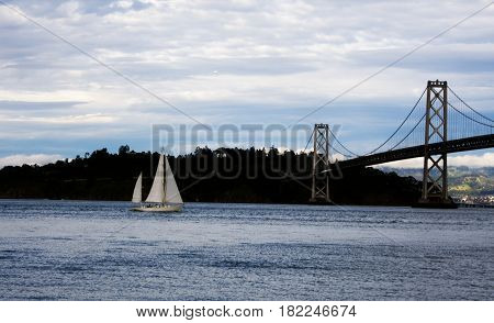 Sailboat headed toward San Francisco Bay Bridge