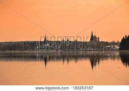Iversky Valday monastery on the shore of the lake in the early morning at sunrise
