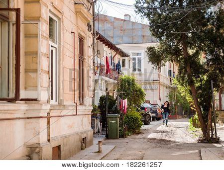BUCHAREST ROMANIA - APRIL 12016: Bucharest old street - typical old Bucharest architecture with vintagebuilding on a sunny day