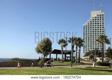 NETANYA, ISRAEL - AUGUST 29, 2015: People walk on sea promenade of Netanya, Israel