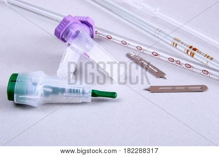 set of laboratory supplies. Petri dish, Spectrophotometer quvettes, blood test, test-tube