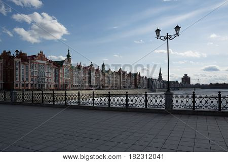 Yoshkar-Ola, Russia - April 13, 2017 Photo of beautiful houses in Belgian style on the Brugge embankment in the central part of the city of Yoshkar-Ola, Russia