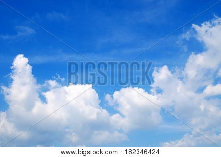 White clouds in the blue sky with empty space background
