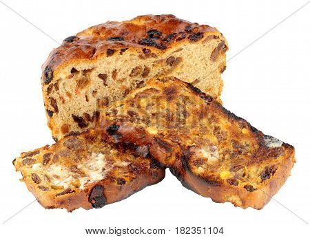 Toasted Irish barmbrack sweet bread slices with butter isolated on a white background