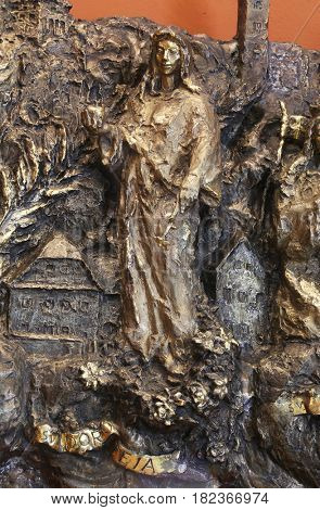 ZAGREB, CROATIA - MARCH 31: Saint Dorothea, bas relief in Chapel of Saint Dismas in Zagreb, Croatia on March 31, 2015