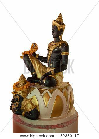 Buddha and Rahu sculptures at Buddhist shrine in Thailand. Hindu deities black.